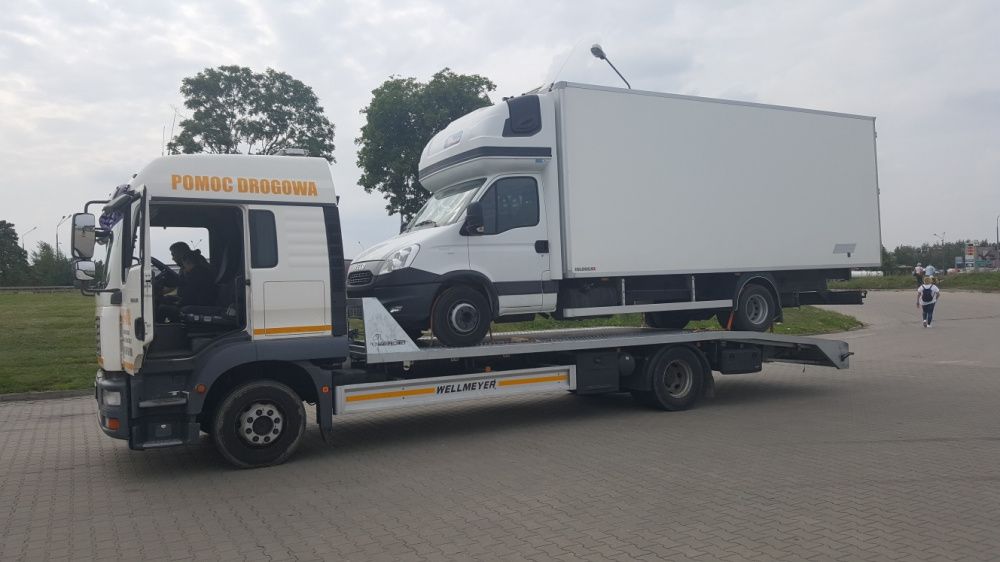 Transport pomoc drogowa laweta bus holholowanie