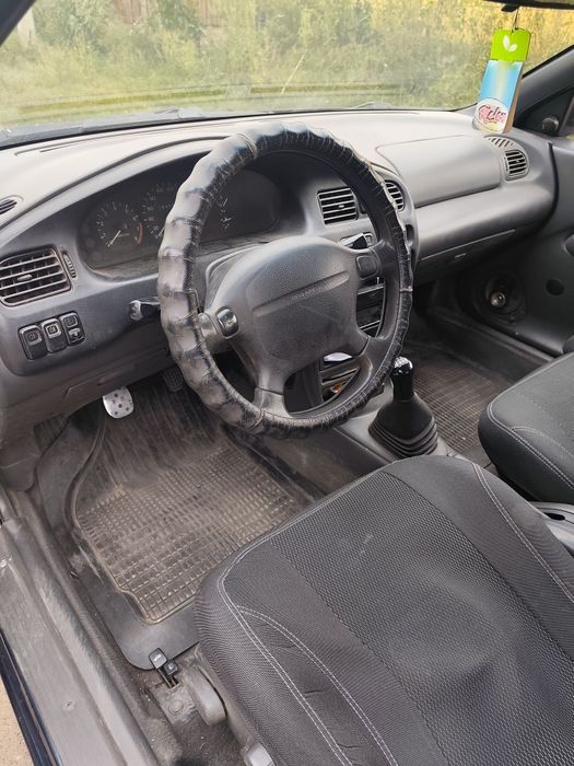 Mazda 323 1998 год