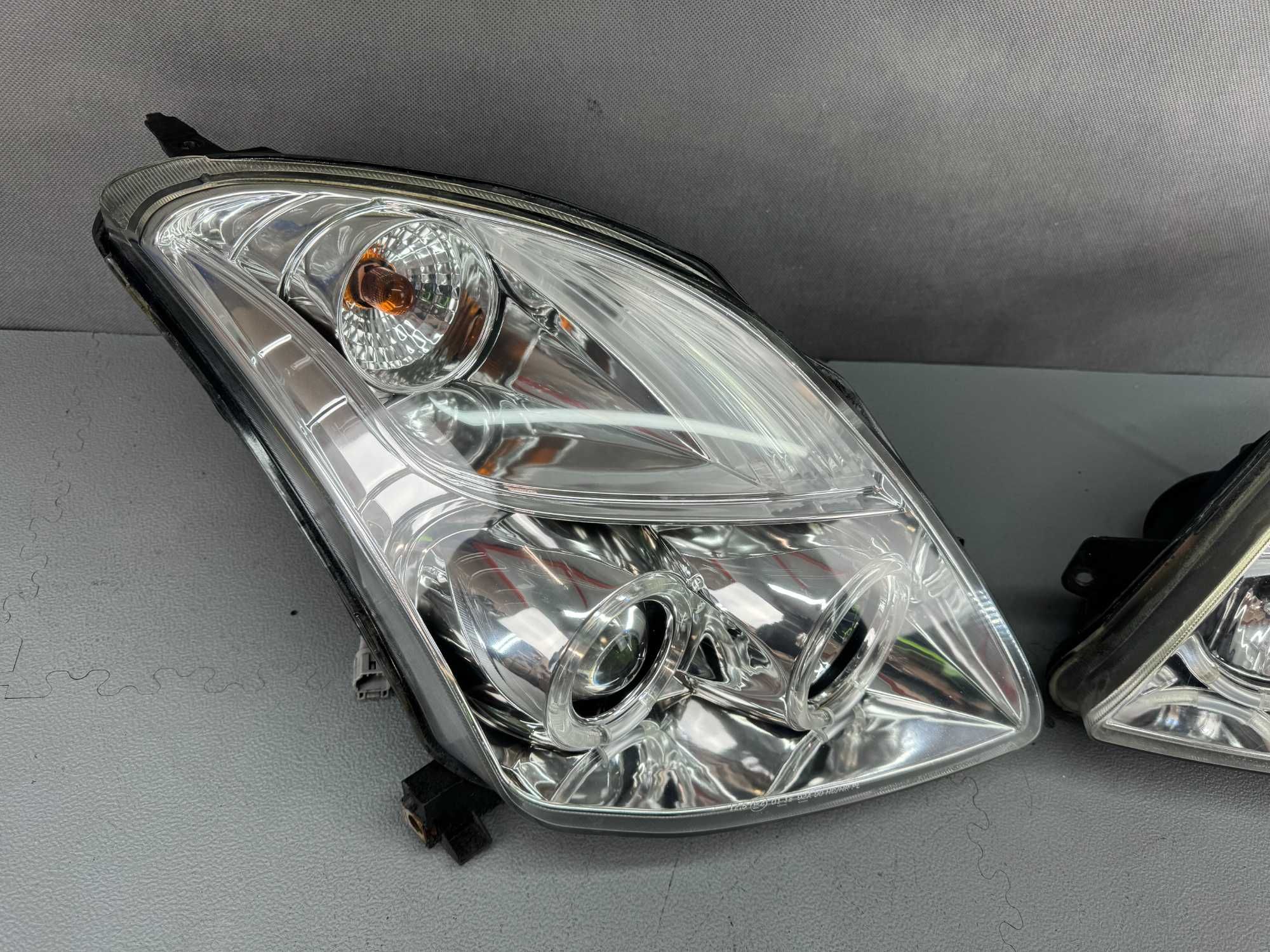 Suzuki Swift IV Lampy Przednie Lewa+Prawa Komplet Europa Ringi LED