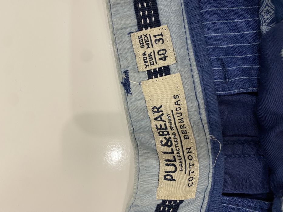 Calções azuis - rapaz