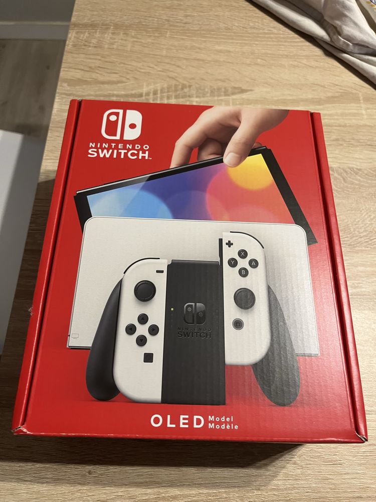 Nintendo Switch OLED Branca + Mumba oficial Case