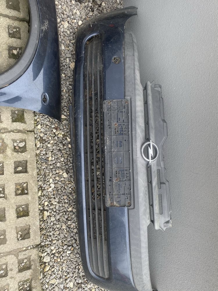 Opel Corsa C lampy, zderzak, blotnik, licznik