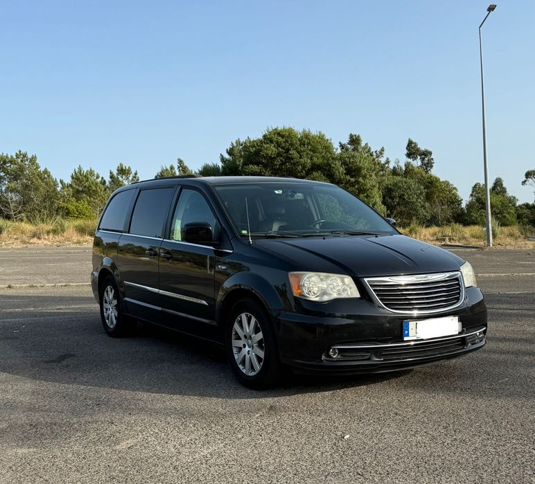 Chrysler town & country.
Gasolina/Gas