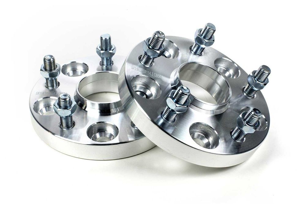 Par de espaçadores "bolachas" com várias furações