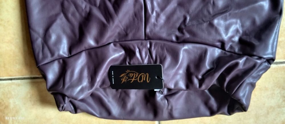 Жіночі брюки (лосини) з екошкіри великого розміру