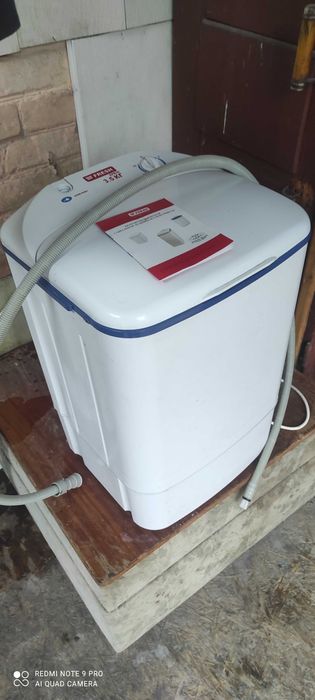 новая пластиковая стиральная машина как старая круглая Советская