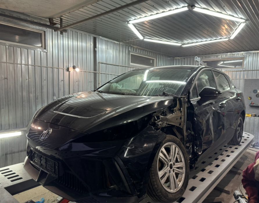 Рихтування авто на стапелі.