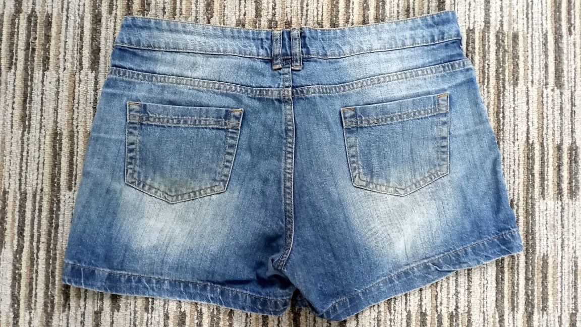 Krótkie spodenki damskie szorty dżinsowe przecierane niebieskie 40