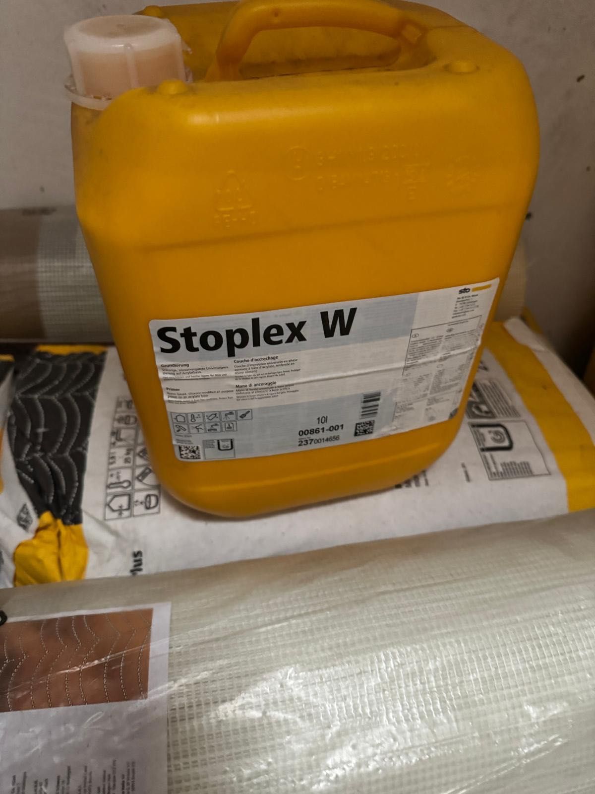 Tinta e material de isolamento de exterior STO