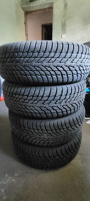Opony zimowe z felgami Nokian WR Snowproof 195/65/15 bieżnik 6-7mm