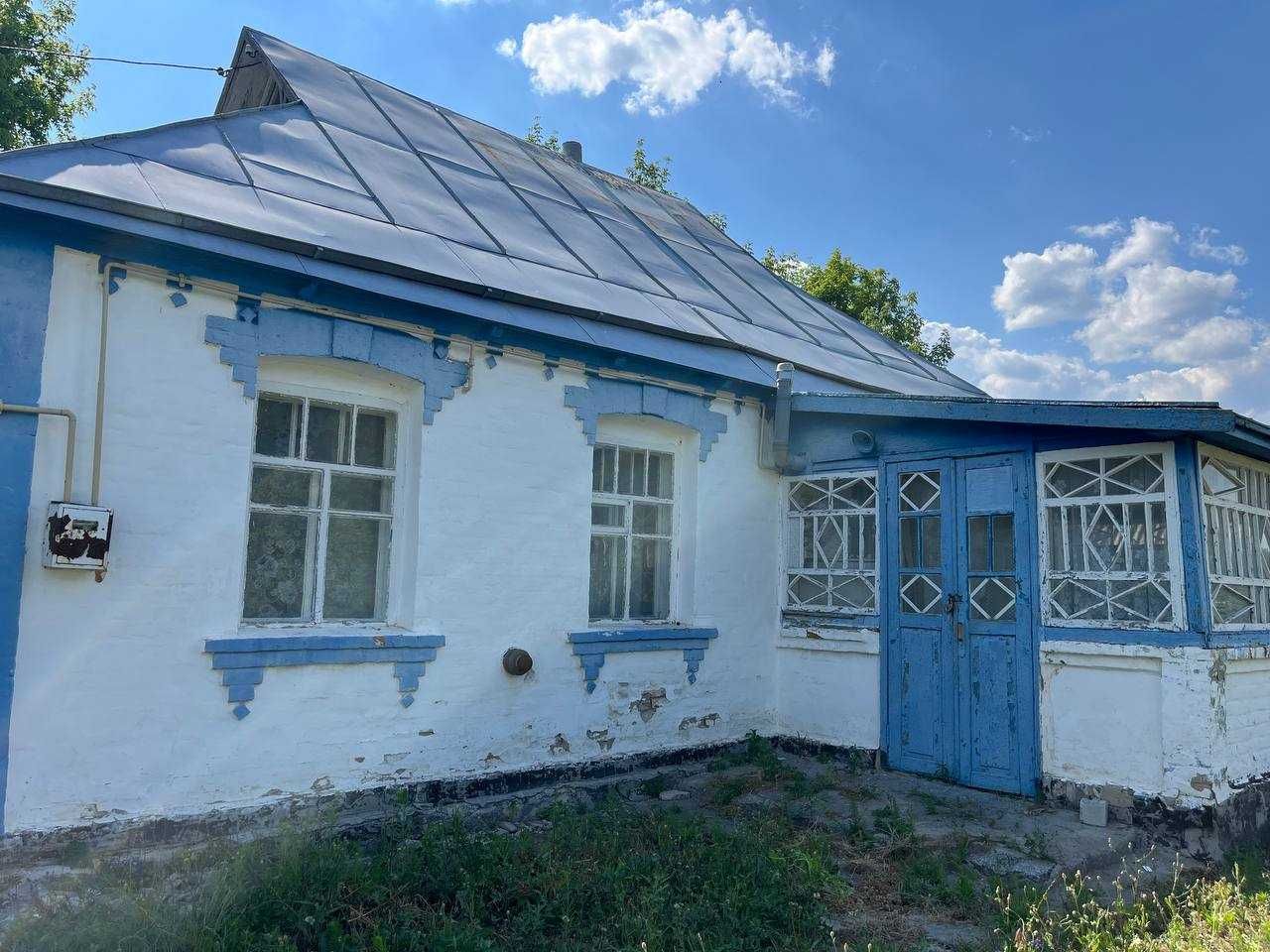 Продаж будинку з земельною ділянкою