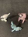 Três figurinhas antigas