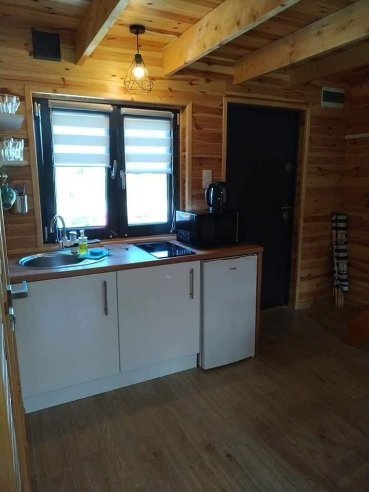 Domki Mielno Arkadia podgrzewany basen,  dmuchana zjeżdżalnia. ZOBACZ
