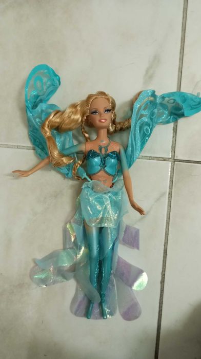 4 Barbies e mala de transporte