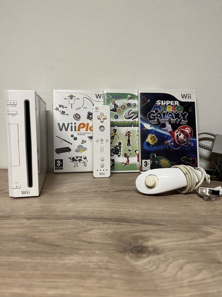 Nintendo wii com comando e 3 jogos originais