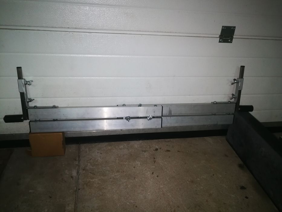 Łata brukarska regulowana na rolkach