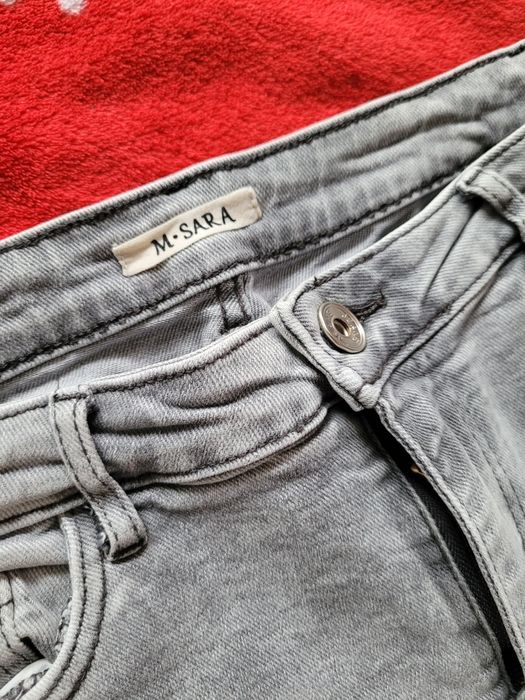 Spodnie jeansy M.Sara z zamkami