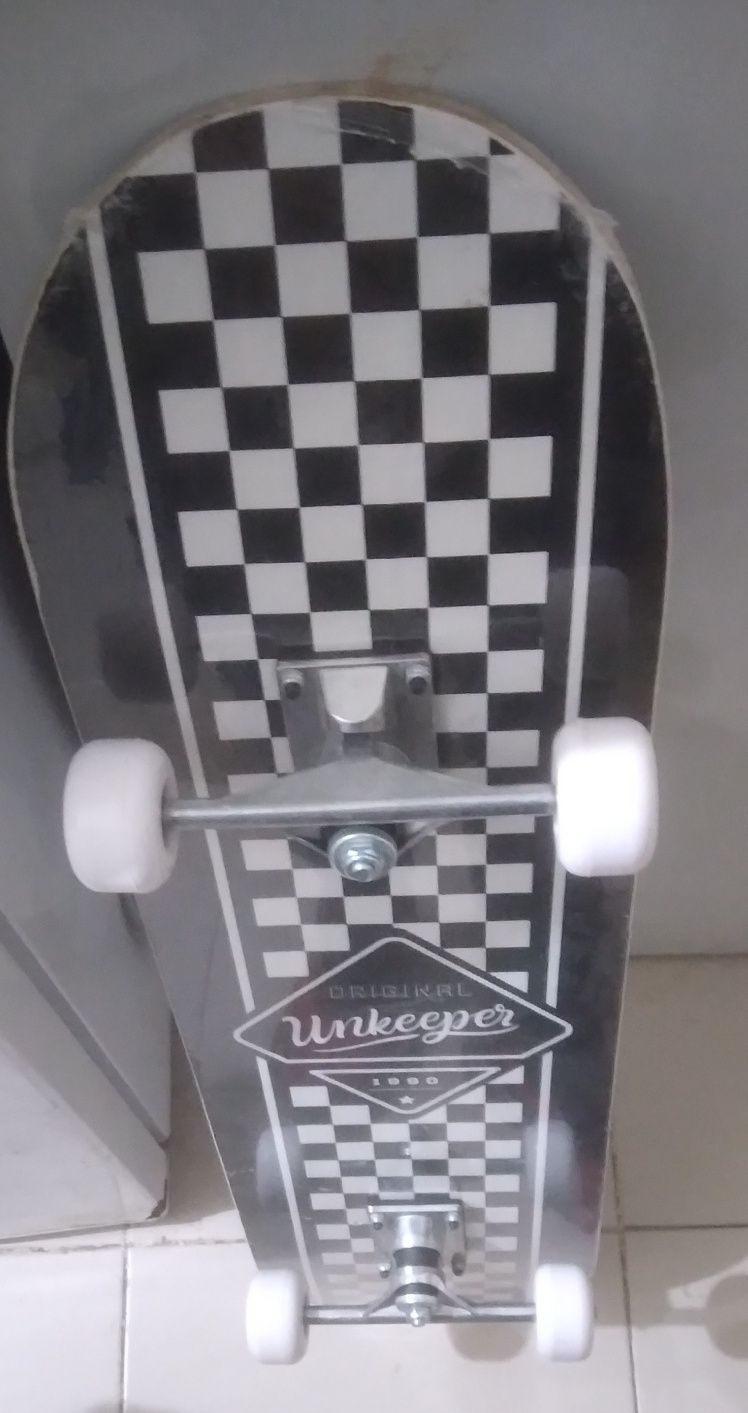 Skarte ukeeper plastificado