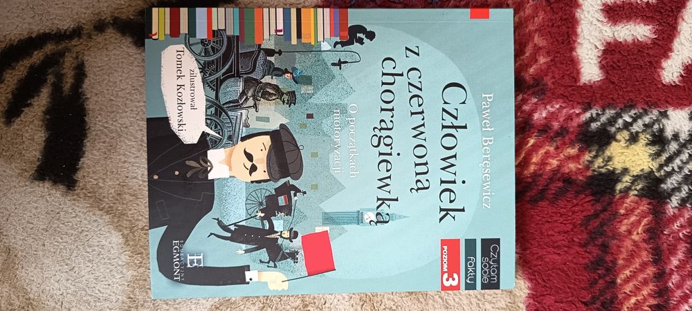 Książka człowiek z czerwoną chorągiewką