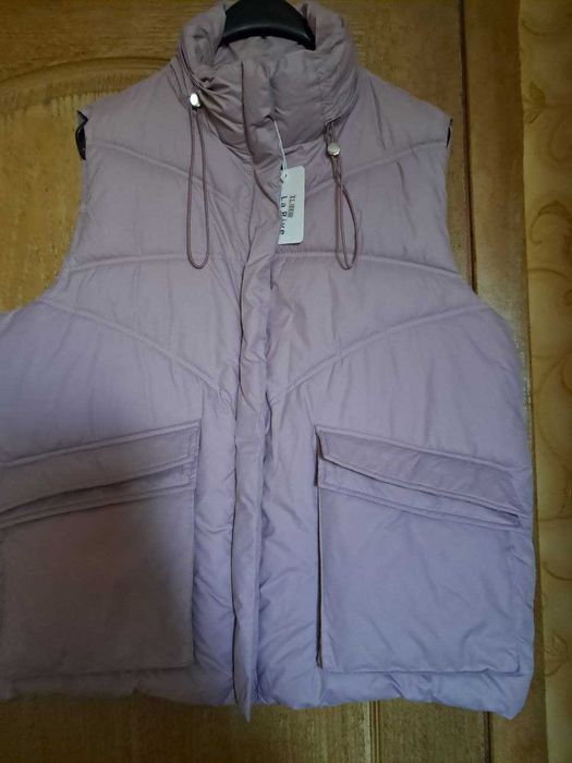 жіночий жилет ,верхня одежа