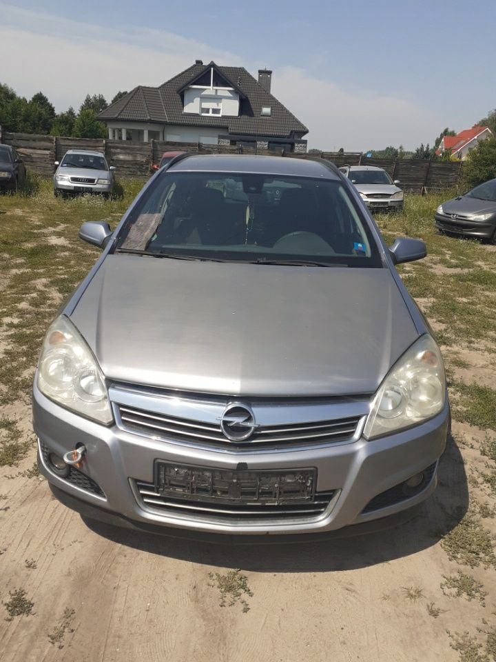 Opel astra h z163 drzwi maska lampa zderzak blotnik klapa koła pas