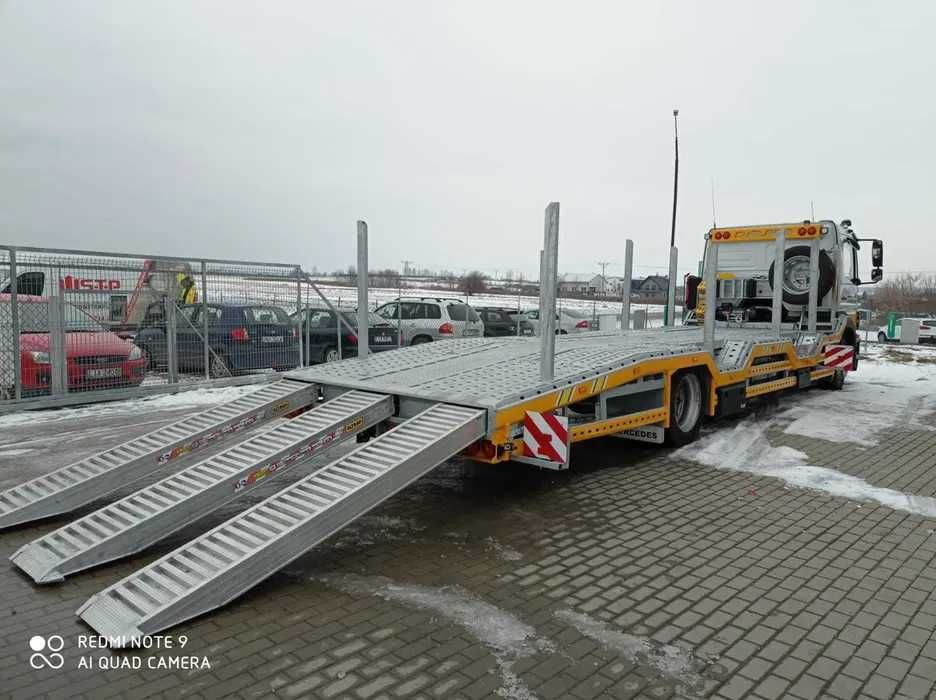 Pomoc drogowa , transport maszyn laweta autolaweta usługi transportowe