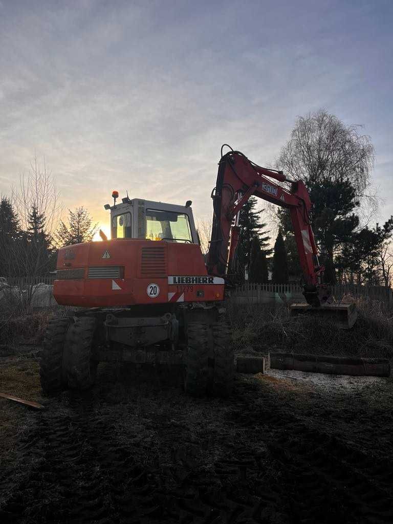 Usługi koparką kołową LIEBHERR – wykopy, niwelacja, prace ziemne