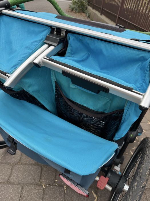 Przyczepa rowerowa thule cross 2 z zestawem biegowym oraz 1 śpiworem