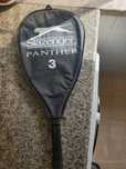 Raquete de tennis