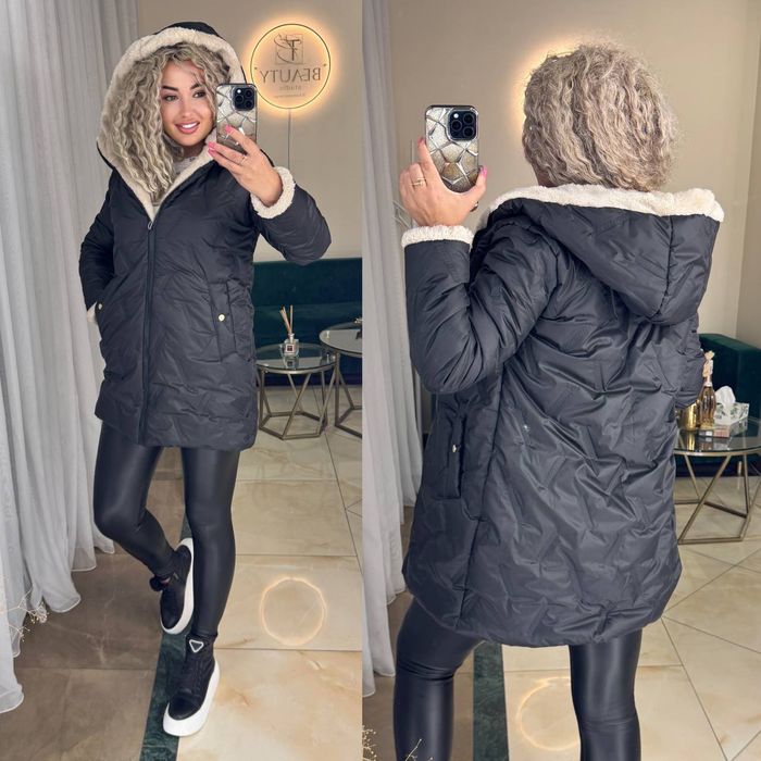 Тепла зимова  жіноча стьобана куртка на хутрі.42-44,46-48,50-52