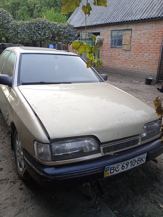 Розбирається Форд Скорпіо