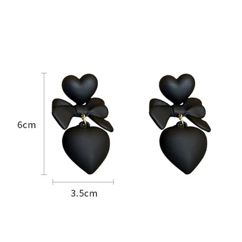 Retro kolczyki czarne serca z kokardką