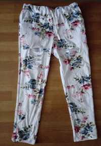 Nowe spodnie w kwiaty z dziurami letnie