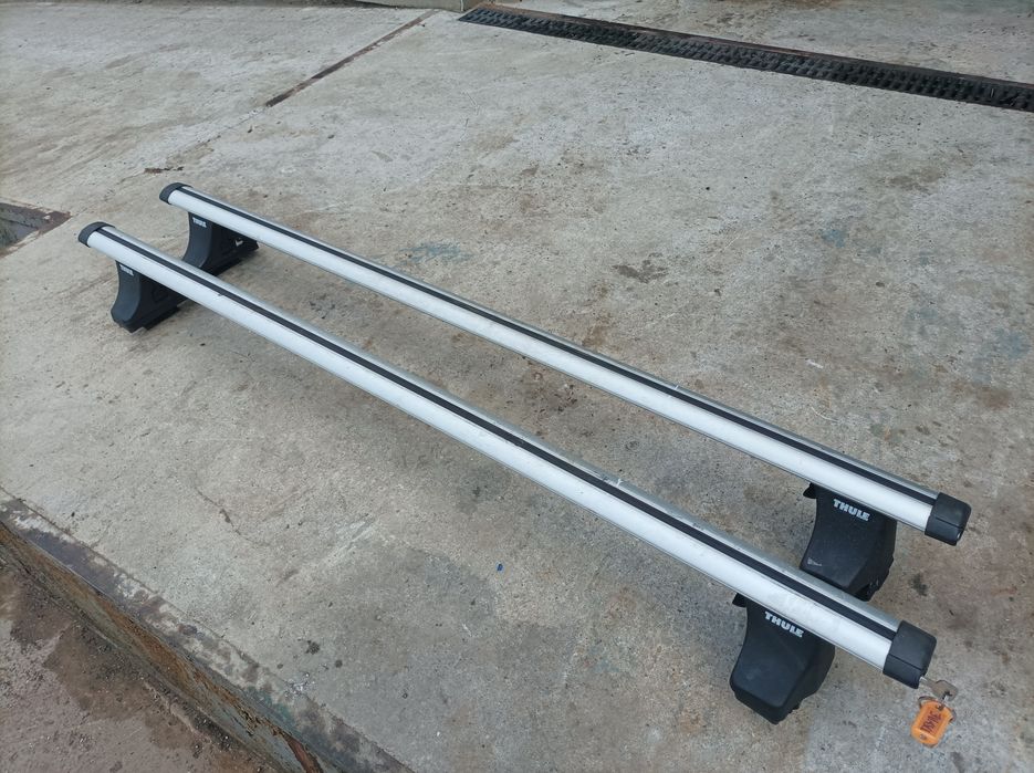 Поперечины Thule на гладкую крышу