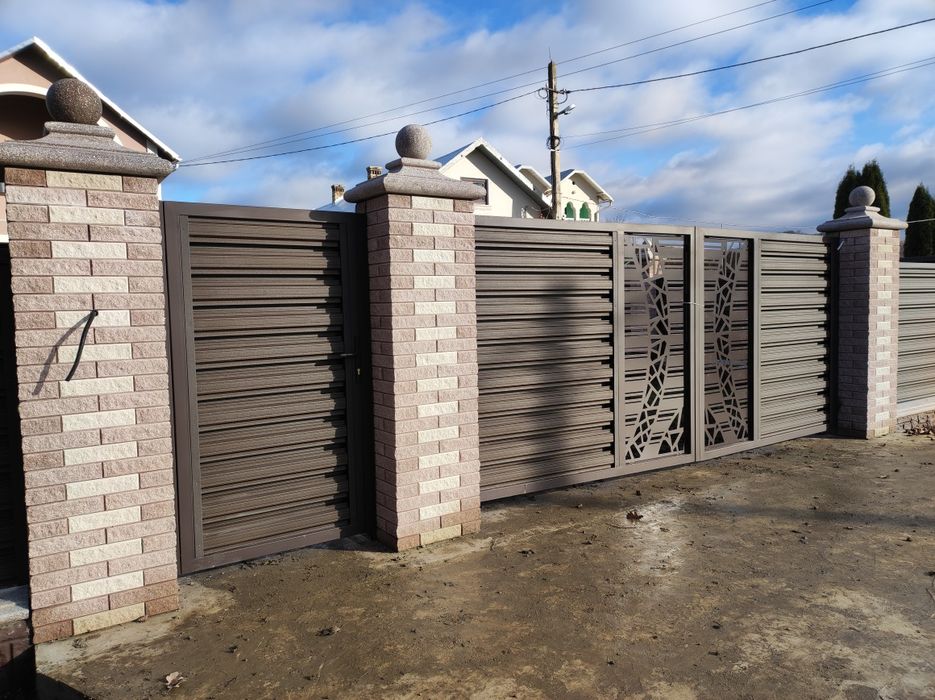 ... SaneX - Group ... Фабрика воріт та металоконструкцій