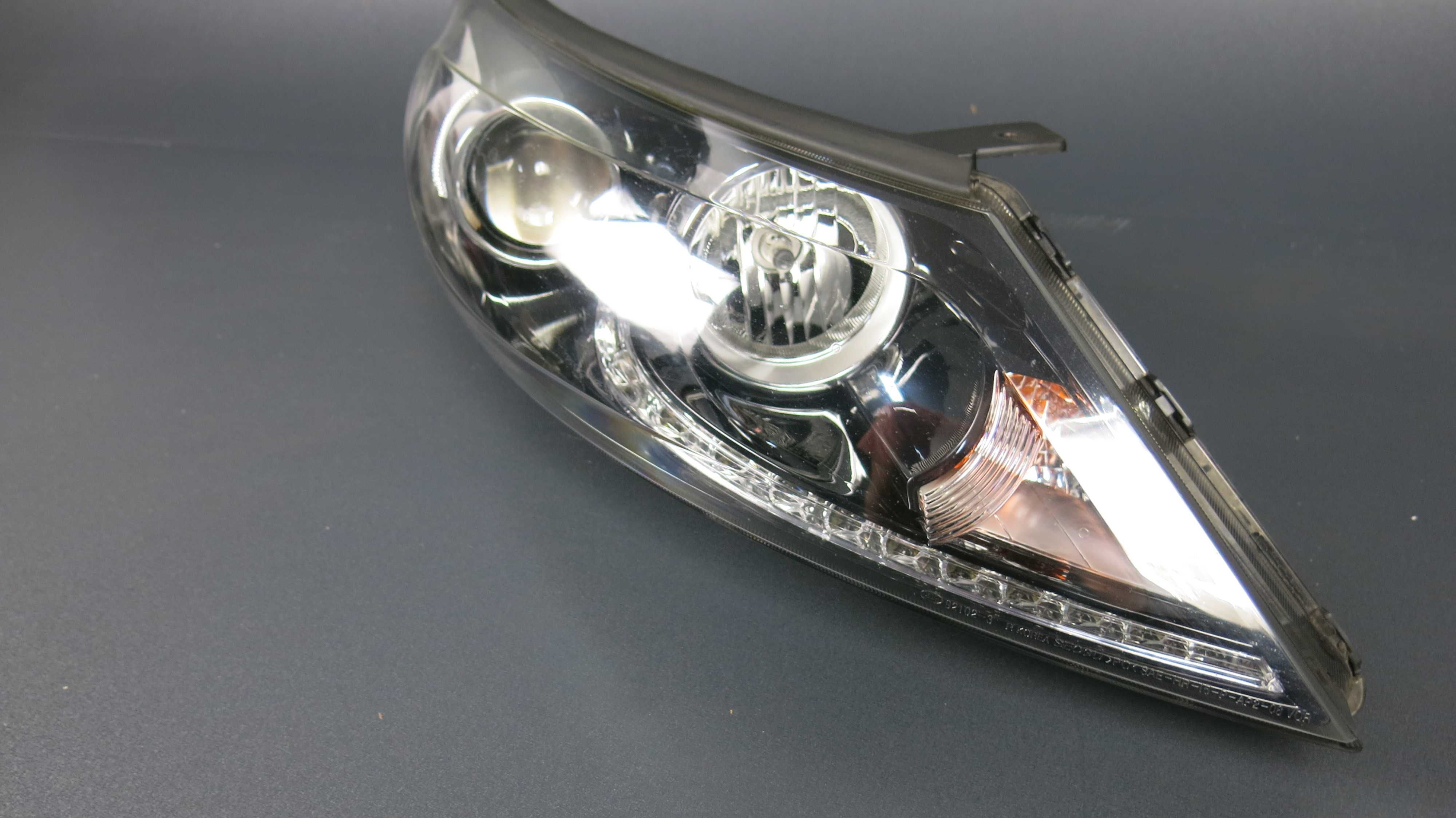 KIA Sportage III 3 lampa przednia przód prawa