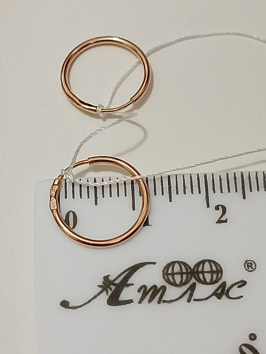 Золотые серьги- кольца 585 пробы.