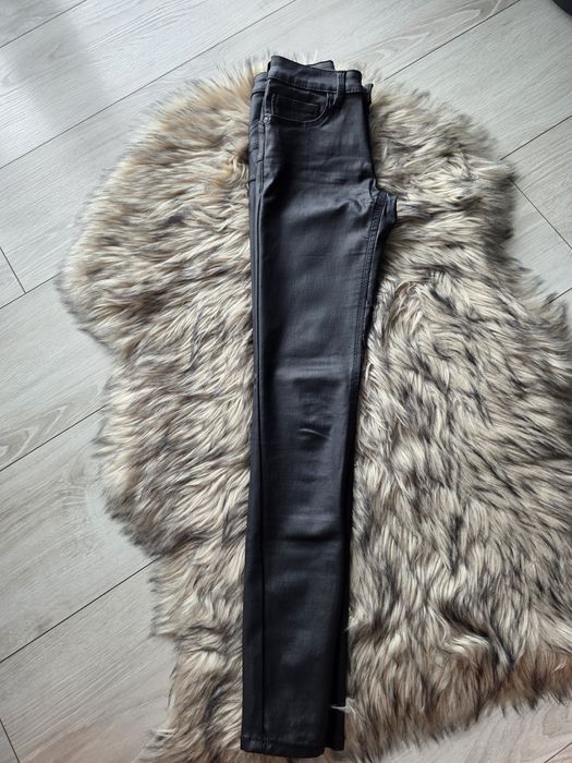 Woskowane spodnie Mango rozm. 32 push-up