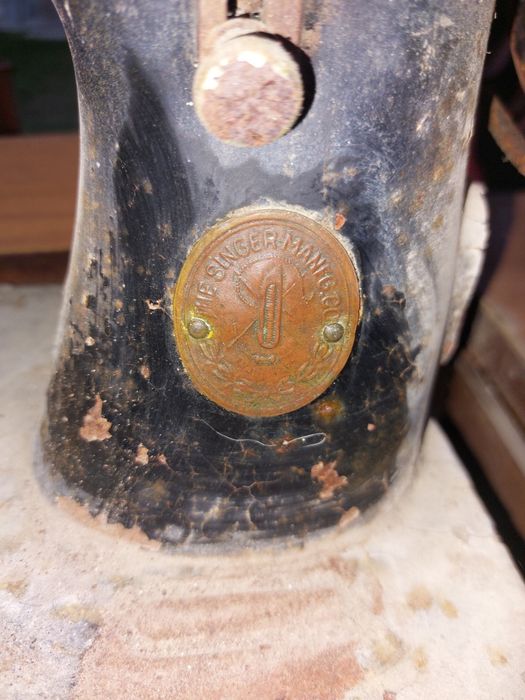 Máquina de costura singer