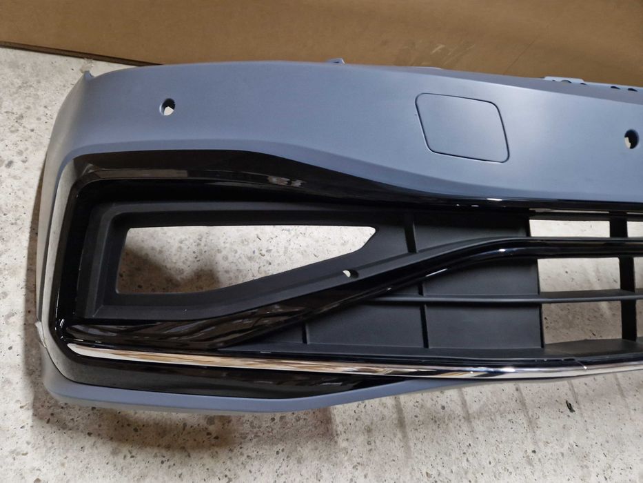 Передний бампер (стиль R-Line) на Volkswagen Passat B8 2014-2019 года.