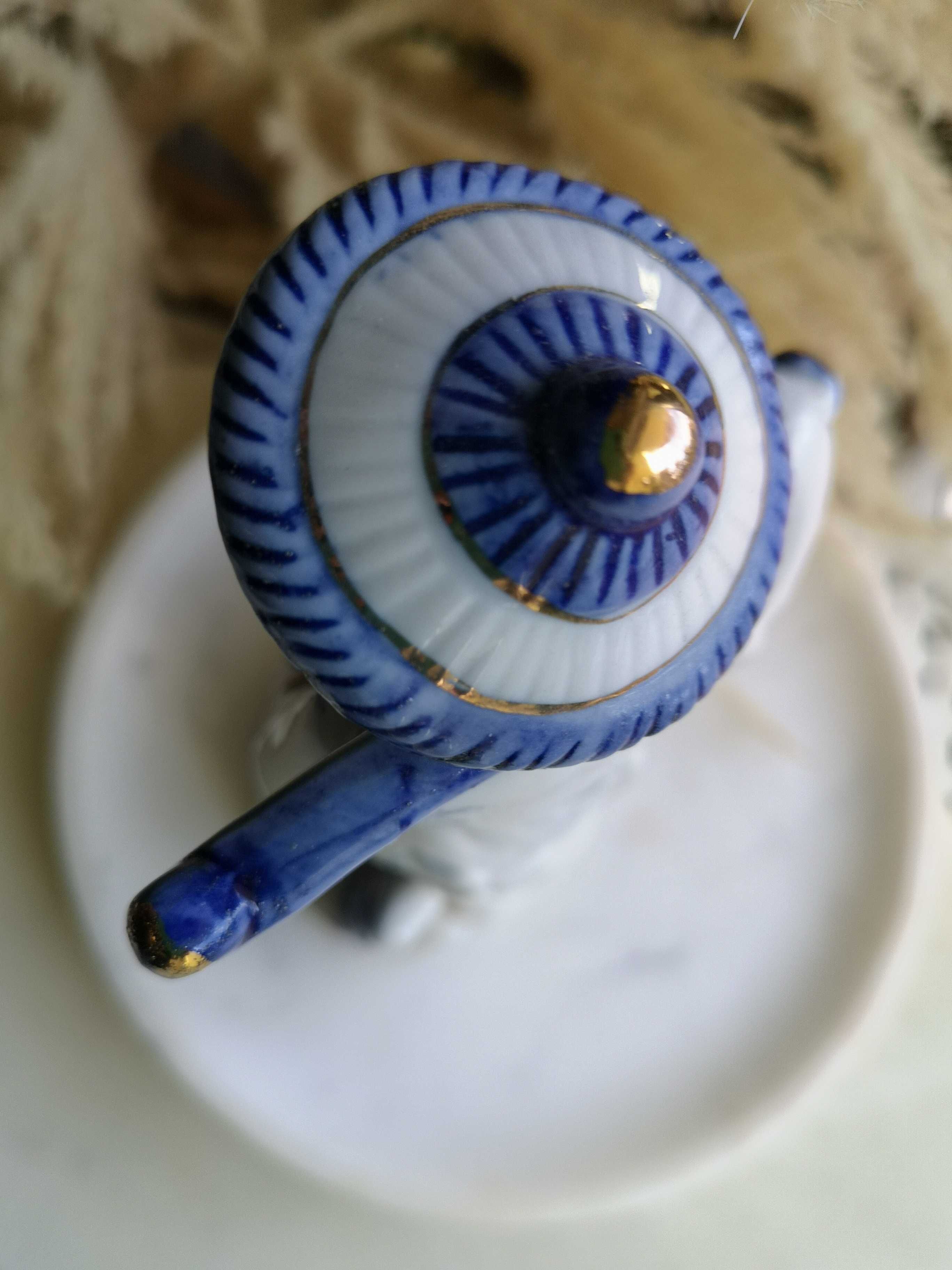 figurka porcelanowa rybak
