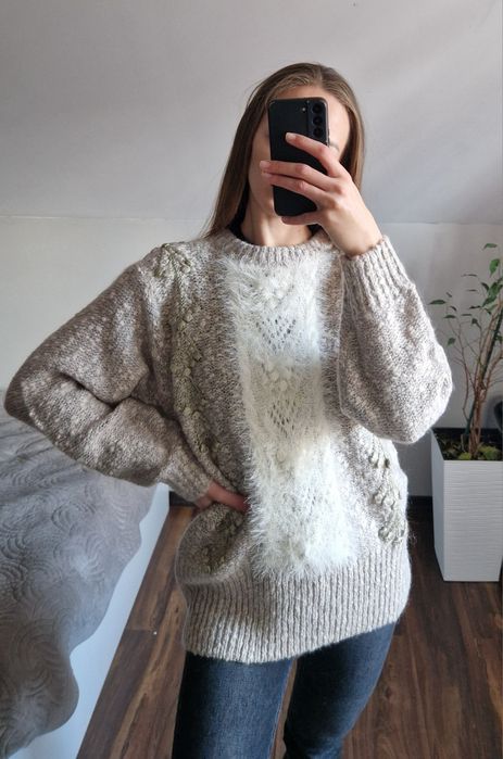 Elegancki i ponadczasowy sweter wykonany z luksusowej wełny