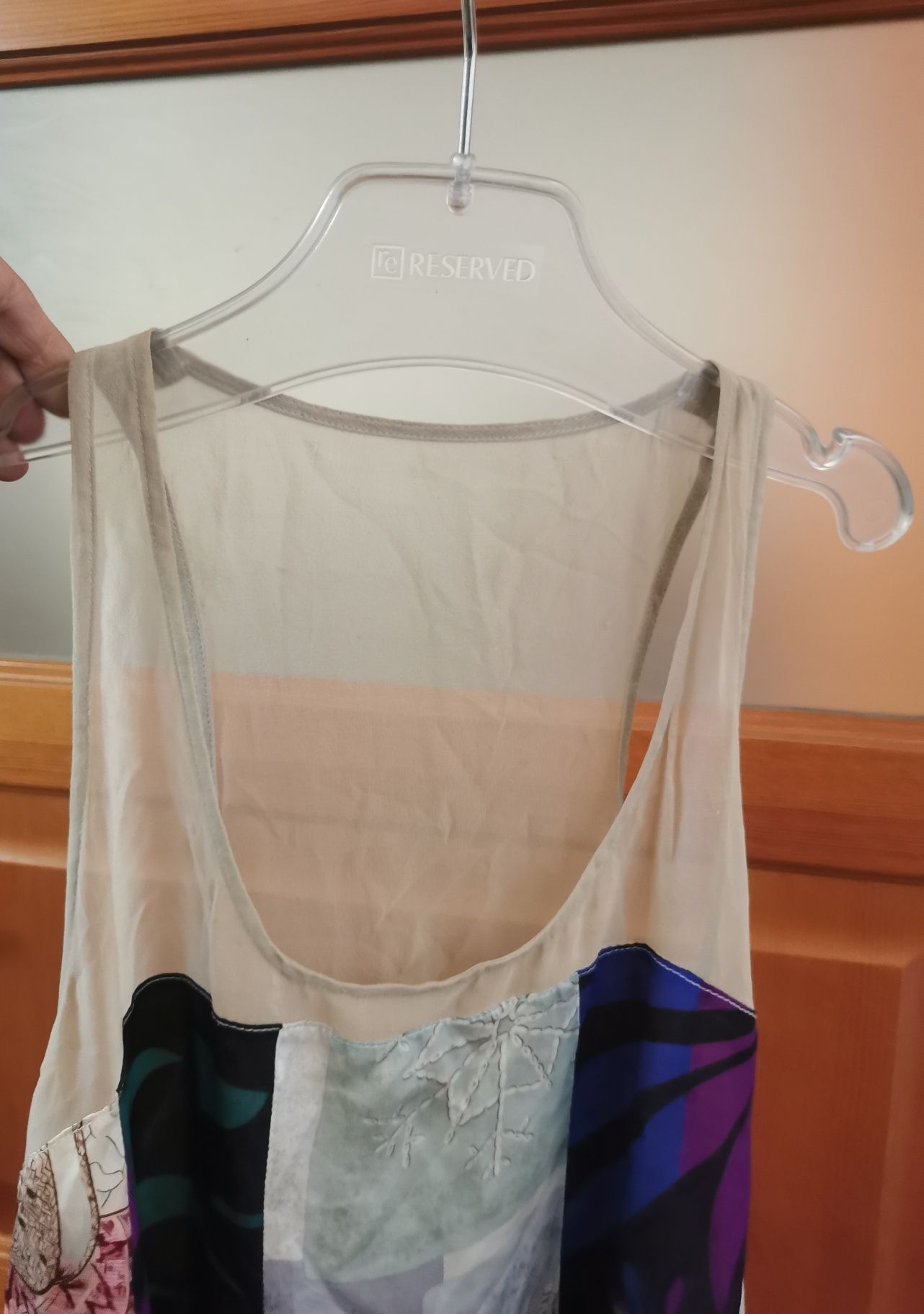 Jedwabna bluzka boho patchwork – rozmiar 4
Materiał:  jedwab

Zjawis