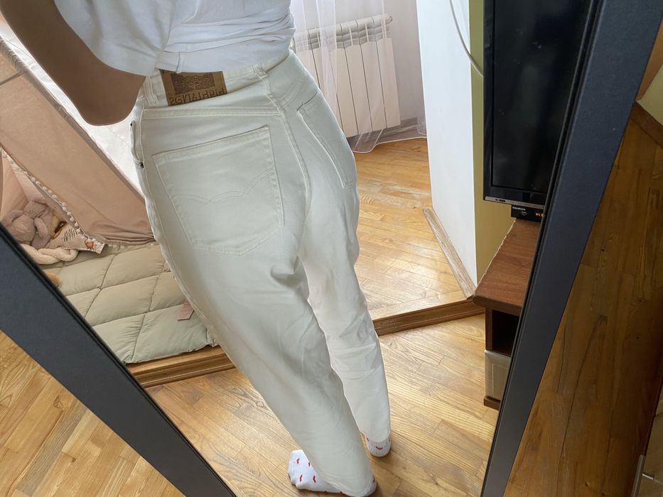 Продам джинси молочні