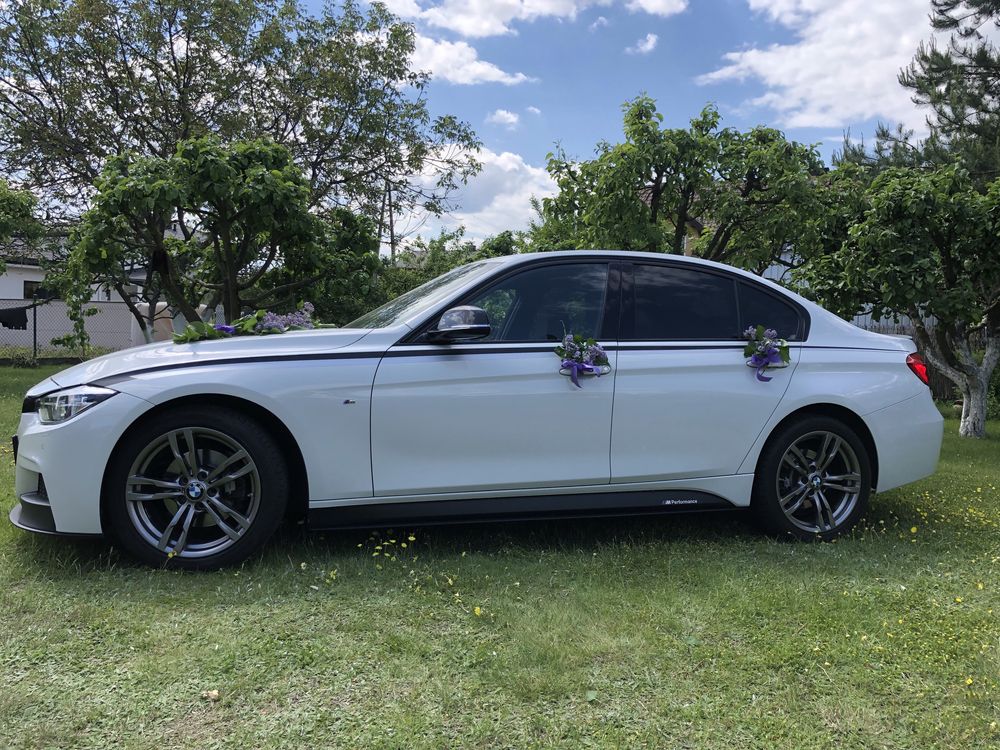 Auto ślubne. Samochód do ślubu - piękne, białe BMW