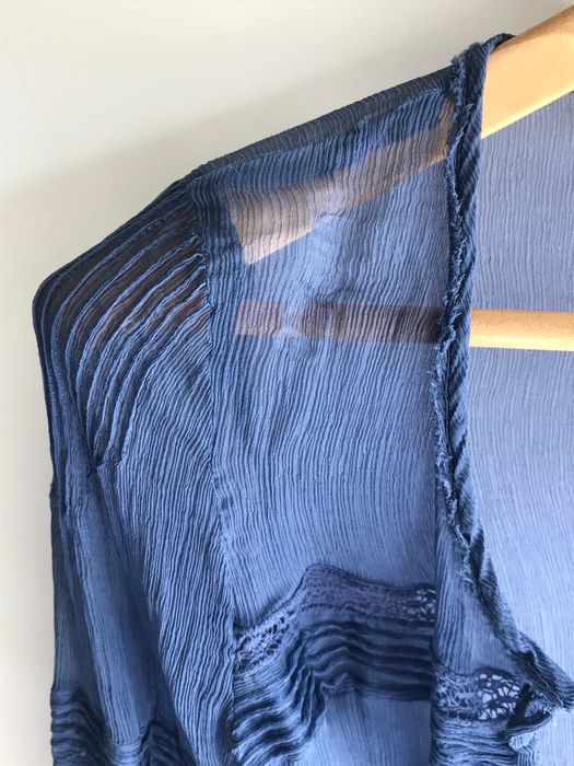 Blusa transparente azul