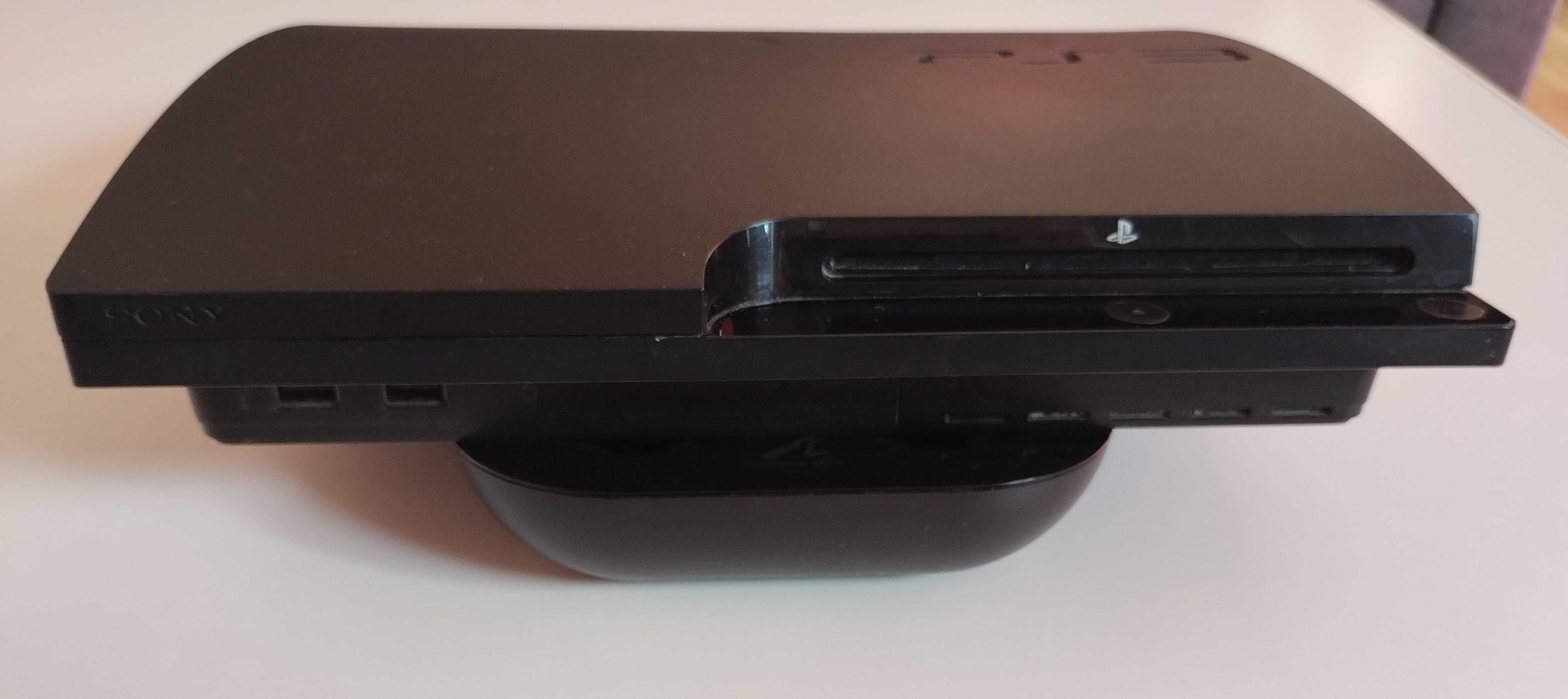 Konsola Sony PS3 + dwa pady + dwa kontrolery Move +  14 płyt z grami