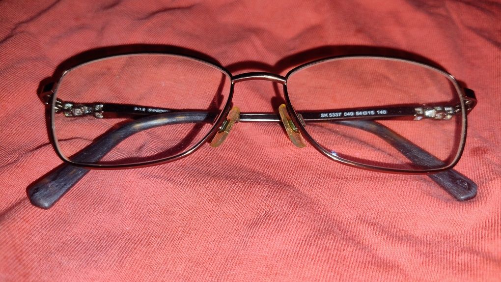 Okulary Swarovski, Safilo, Cellidor