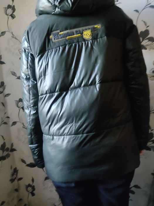 Продам пуховик в гарному стані