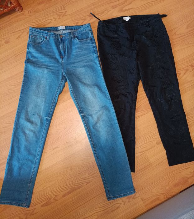 Пакетом джинси/штани жіночі